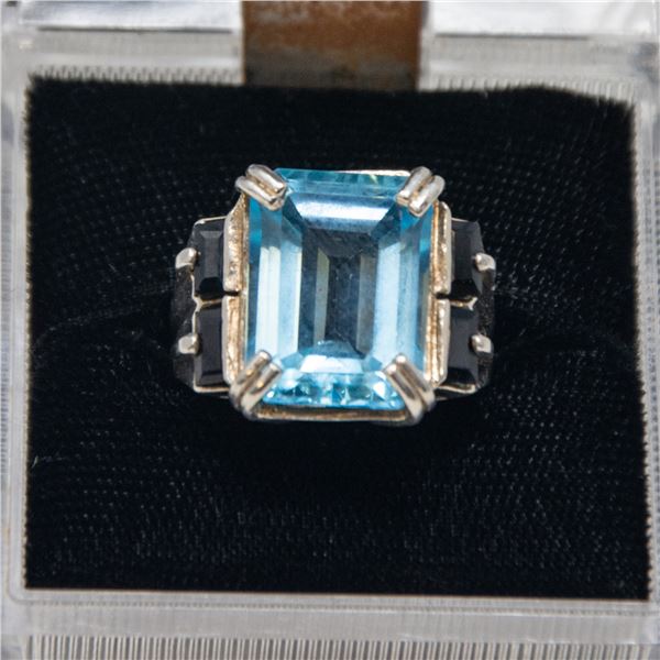 SILVER RING, LARGE BLUE STONE AND BLACK STONES