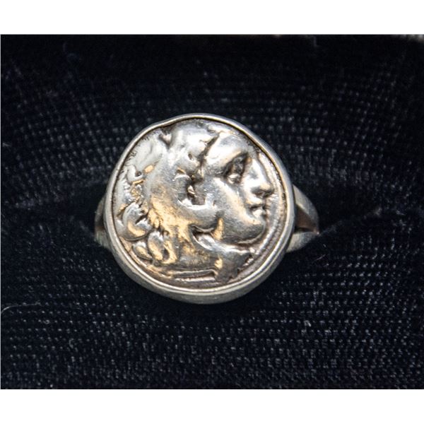 STERLING SILVER RING, PROFILE HEAD, APPROX. SIZE