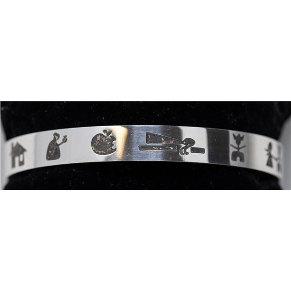 STERLING SILVER BANGLE WITH ENGRAVED ART