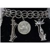 Image 1 : STERLING SILVER CHARM BRACELET WITH 9 CHARMS, 7"