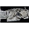 Image 1 : STERLING SILVER CHARM BRACELET WITH 35 CHARMS,