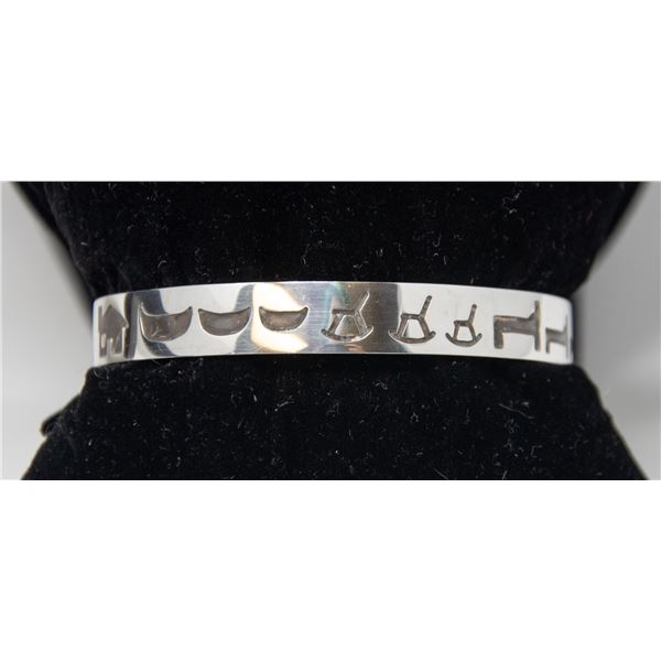 STERLING SILVER BANGLE WITH ENGRAVED ART,