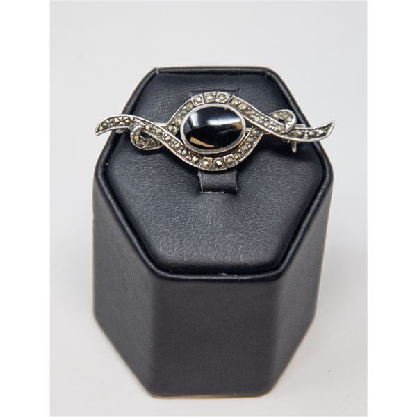 SILVER BROACH WITH BLACK STONE