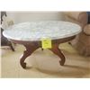Image 1 : Oval Carrera Marble & Wood Table