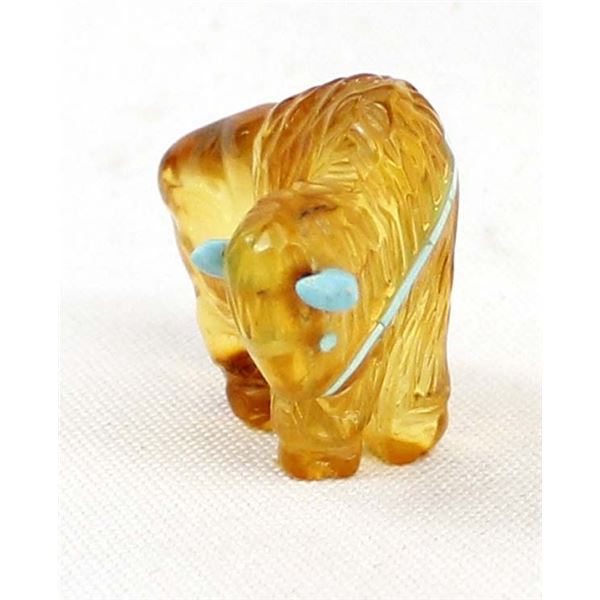 Zuni Amber Buffalo Fetish by Andres Quandelacy