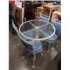 Image 1 : WHITE METAL GLASSTOP DINING TABLE WITH 4 METAL CHAIRS WITH BLUE CUSHIONS - 3 FOOT DIAMETER X 29.5 IN