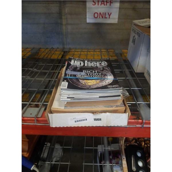 2 stacks of vintage country guides and magazines