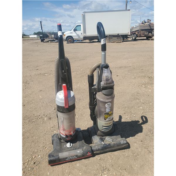 two upright bagless vacuums