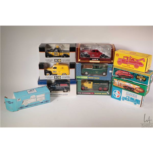 Eleven die cast model toy banks including Eatons, Napa, Texaco, John Deere, International, Shell Can