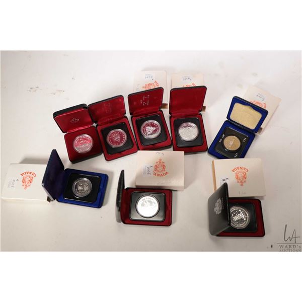 Eight boxed Canadian silver dollars including 1973, 1974, 1975, 2 X 1976, 1977, 1978 and 1979