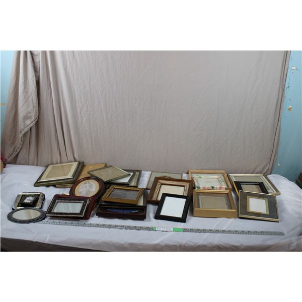 Box of various sized picture frames