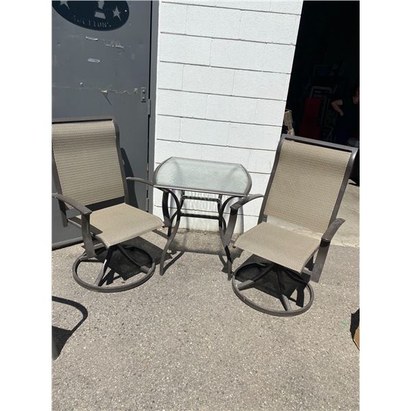 Patio table and 2 swivel chairs