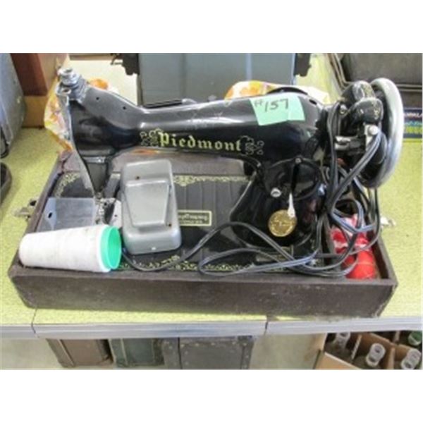 VINTAGE PORTABLE PIEDMONT SEWING MACHINE, HAS HUDSON’S BAY INSIGNIA