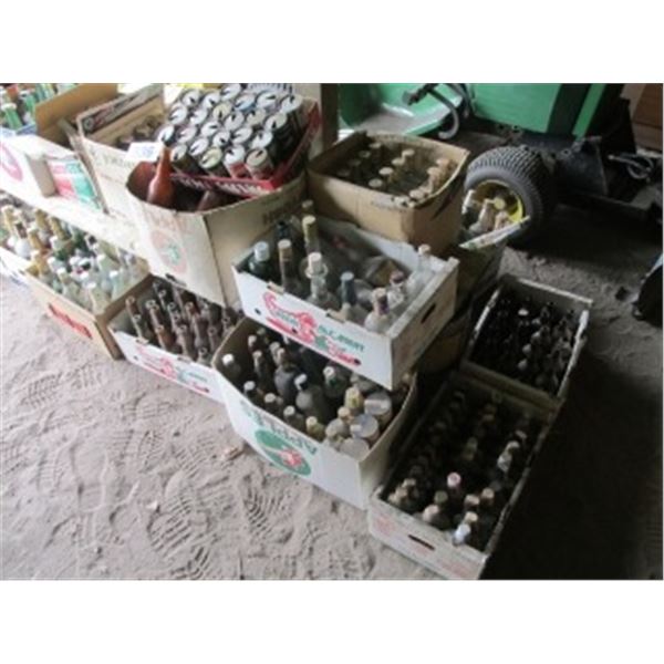 COLLECTION OF LIQUOR & BEER BOTTLES/CANS SOME DATE BACK TO EARLY 1960’S