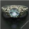 Image 2 : Antique Art Deco 18kt White Gold Round Aquamarine Solitaire Floral Filigree Ring