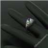 Image 4 : Antique Art Deco 18kt White Gold Round Aquamarine Solitaire Floral Filigree Ring