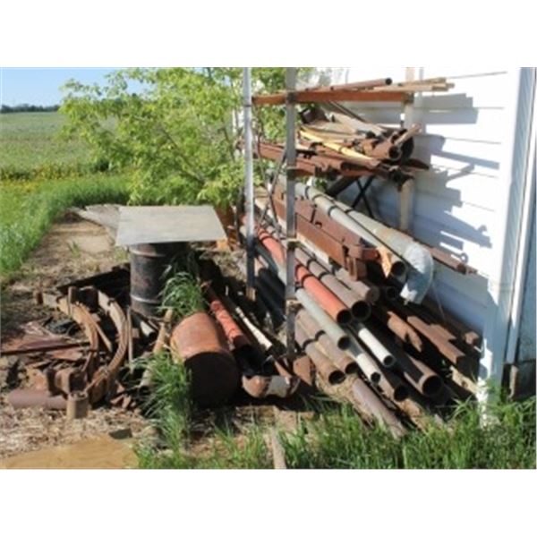 QUANTITY OF SCRAP METAL ON THE EAST SIDE OF THE SHOP