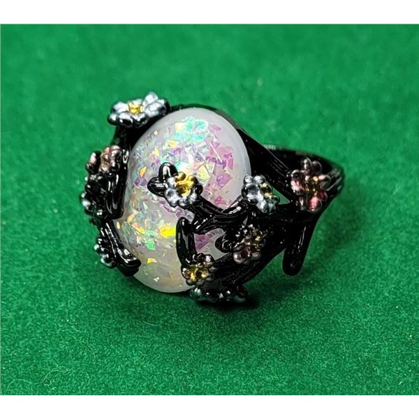 14)  BLACK RHODIUM PLATED RING WITH LAB CREATED