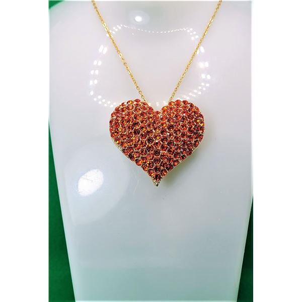 2) GOLD TONE AND ORANGE/RED CRYSTAL HEART