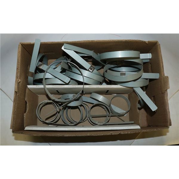 BOX FULL OF ASSORTED PUNCH CLAMPS