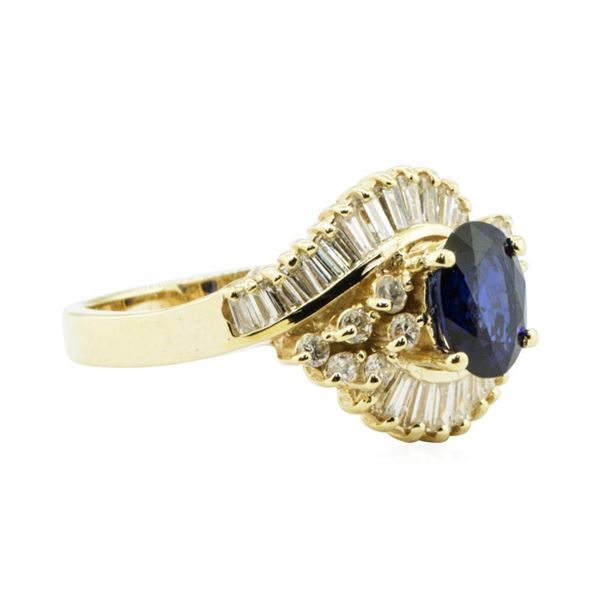 2.19 ctw Oval Brilliant Blue Sapphire And Diamond Ring - 14KT Yellow Gold