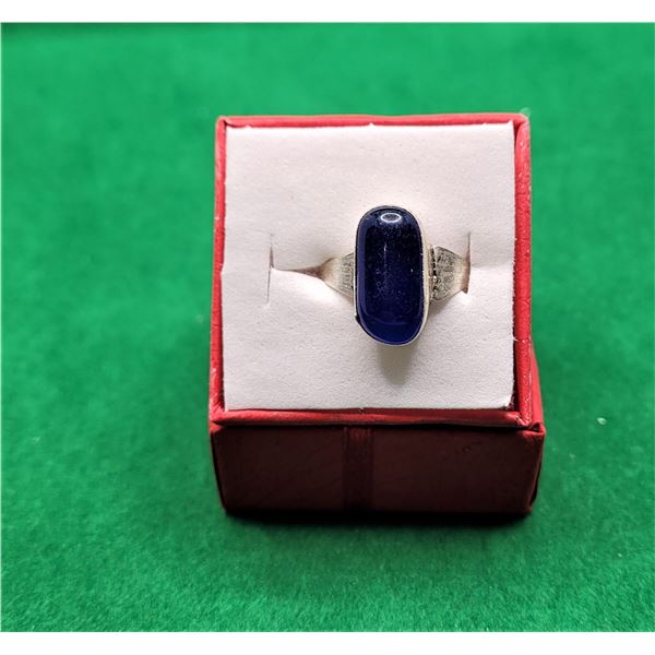 29)  SILVER TONE AND NATURAL ELONGATED