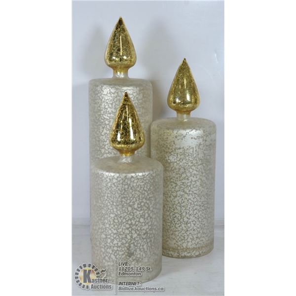 LOT OF THREE FLAMELESS CANDLES.