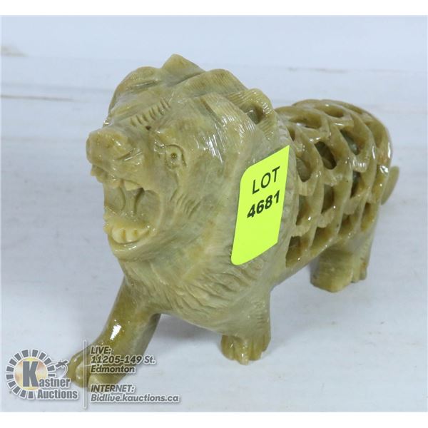 HAND CARVED STONE LION CARVING.