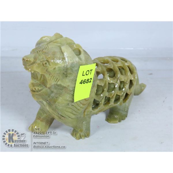 HAND CARVED STONE LION CARVING.
