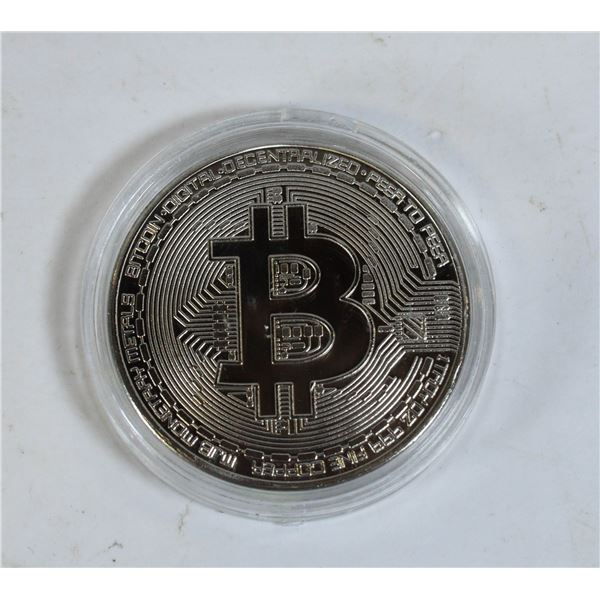 SILVER PLATED BIT COIN IN PROTECTIVE CASE.