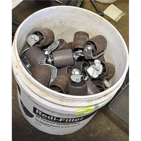 3 GALLON BUCKET OF BEDFRAME CASTERS AND LEG POSTS