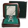 Image 1 : 1998 $30 1/10th Proof Platinum Grey Wolf in original cherry wood both with C.O.A. (Tax exempt) Only