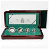 Image 1 : 1999 Muskox 4-coin Fractional Fine Platinum Set in Deluxe Wooden Display Case. You will receive 1oz,