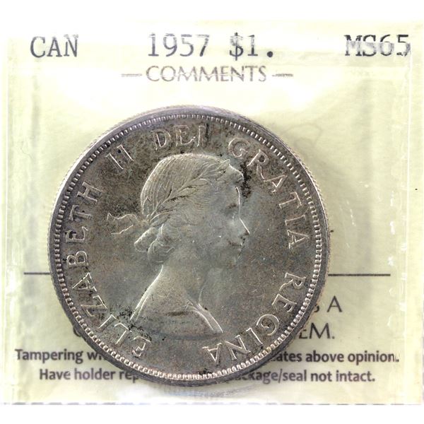 Silver $1 1957 ICCS Certified MS-65!  Light violet tones over pristine fields.