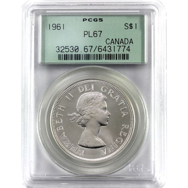 Silver $1 1961 PCGS Certified PL-67. A full white mirror field coin with cameo accents.