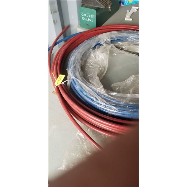 2 ROLLS OF HOT AND COLD PLASTIC WATERLINE