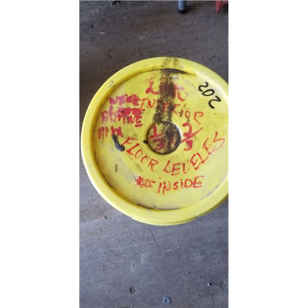 PARTIAL BUCKET OF FLOOR LEVELER