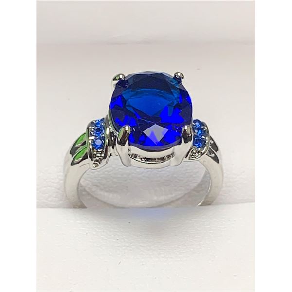 Oval Cut Blue Solitaire  ladies silver dress ring