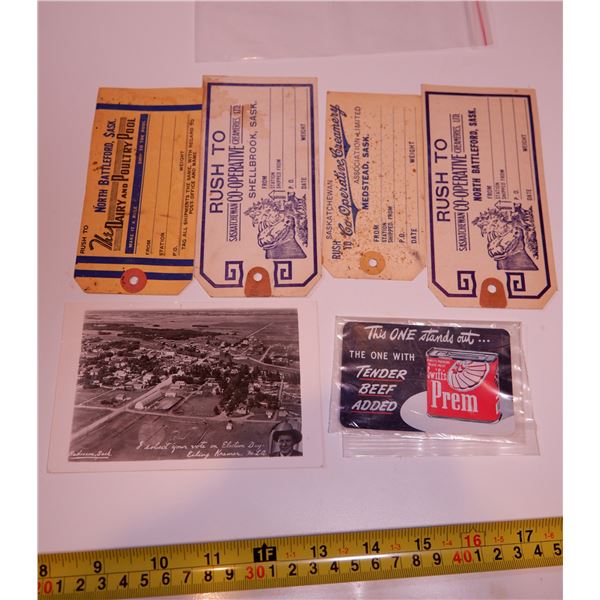 Lot of Vintage Sask. Items: Cream Can Tags, Radisson Postcard, Swift 1949 Calendar