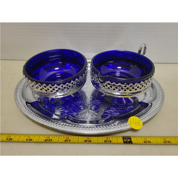 Silver & blue cream and sugar bowls on a tray