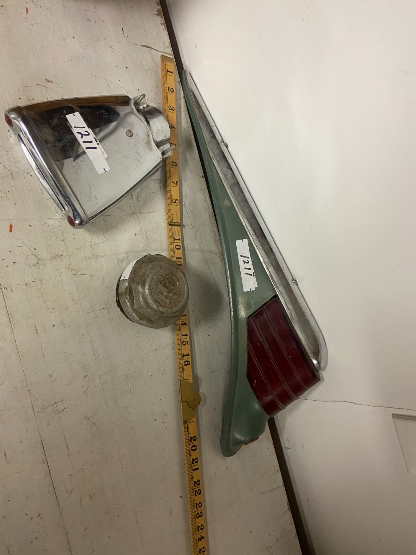 vintage tail lights, REO hub cap, tail pipe bling'