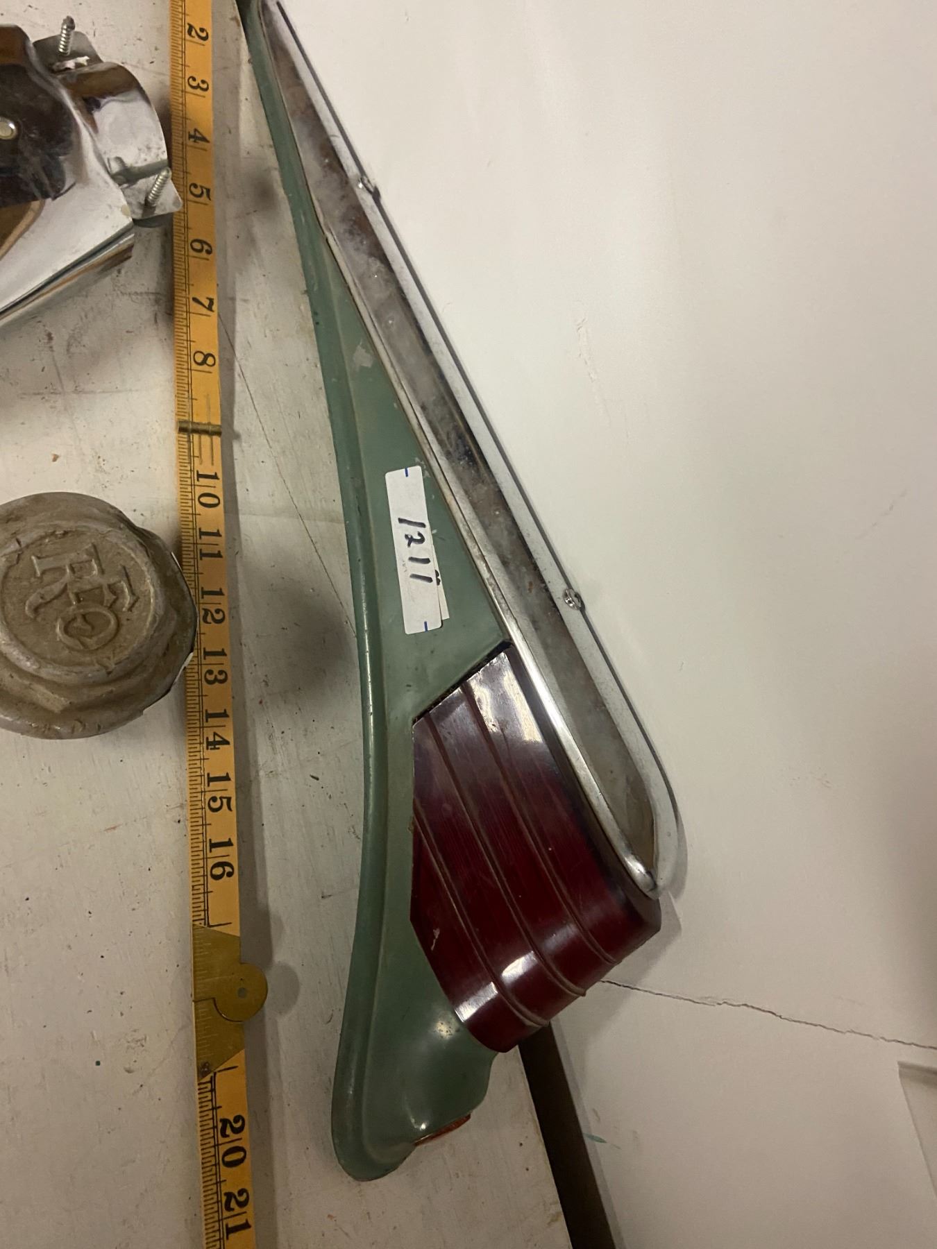 vintage tail lights, REO hub cap, tail pipe bling' Schmalz Auctions
