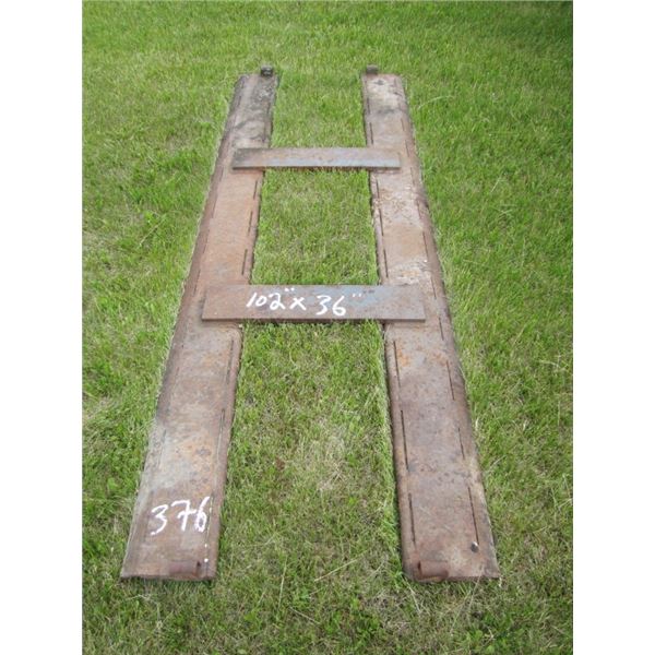 metal lift from elevator driveway for lifting wagons and trucks to dump