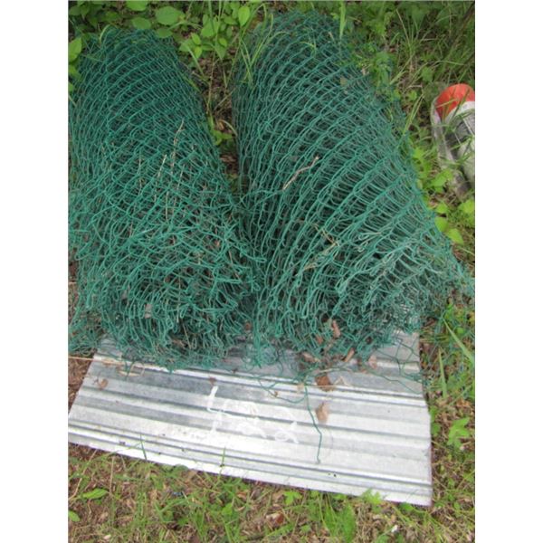 lot with two rolls chain link fence