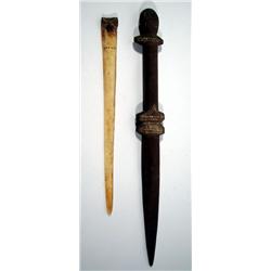 A MASSIM BONE SPATULA AND WOODEN DAGGER