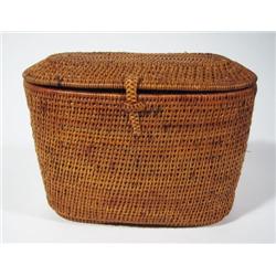A FINE WOVEN CANE BASKET