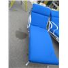 Image 1 : WROUGHT IRON LOUNGE CHAIR WITH WHEELS AND BLUE CUSHION