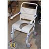Image 1 : AQUATEC ROLLING CHAIR WITH HOLE FOR BEDPAN