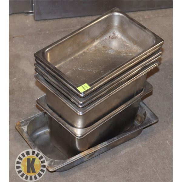 STACK OF ASSORTED SIZE STAINLESS STEEL INSERTS