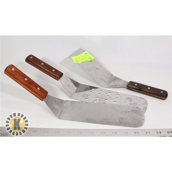 3 LONG SPATULAS- 1 WITH HOLES FOR STRAINING